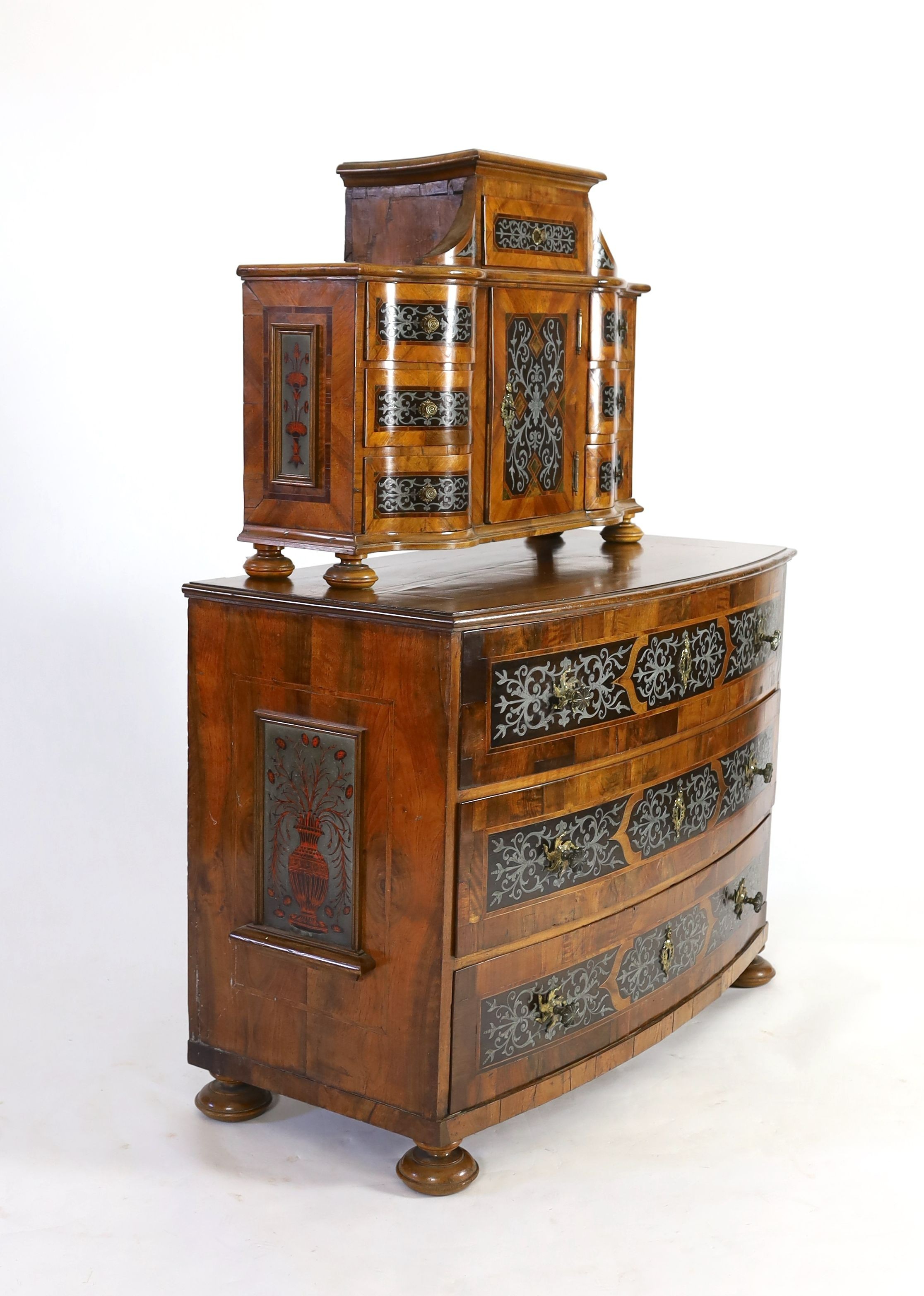 A South German walnut and cut pewter inlaid commode and matching tabernacle, second quarter 18th century, W.113cm D.57cm H.150cm